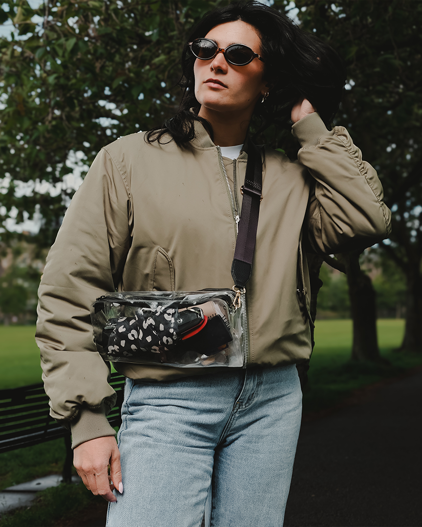 Woman with DivideNPac stadium-approved clear bag urban street style crossbody